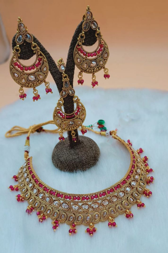 Ethnic Golden Necklace Set In Pink Color
