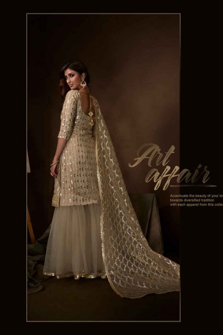 Off White Net Heavy Designer Sharara Suit With Jari Embroidery And Sequence Work