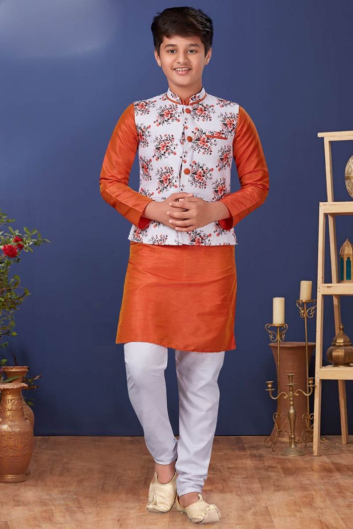 This Designer Dupion Silk Orange Color Kurta Pajama With Waist Coat